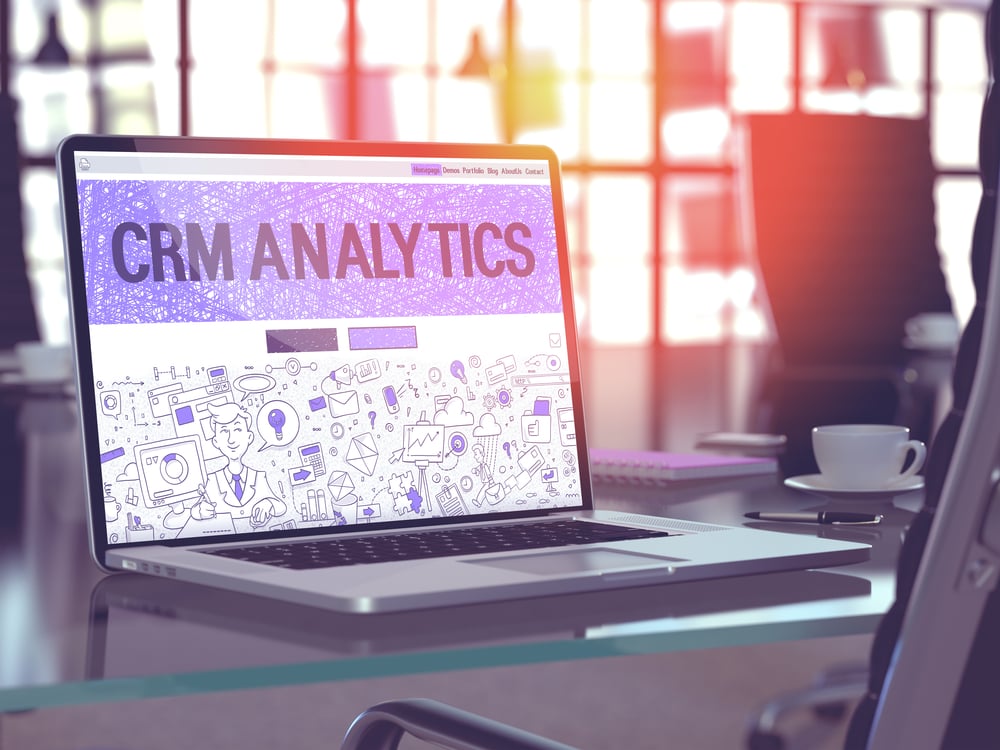 CRM Analytics - Closeup Landing Page in Doodle Design Style on Laptop Screen. On Background of Comfortable Working Place in Modern Office. Toned, Blurred Image. 3D Render